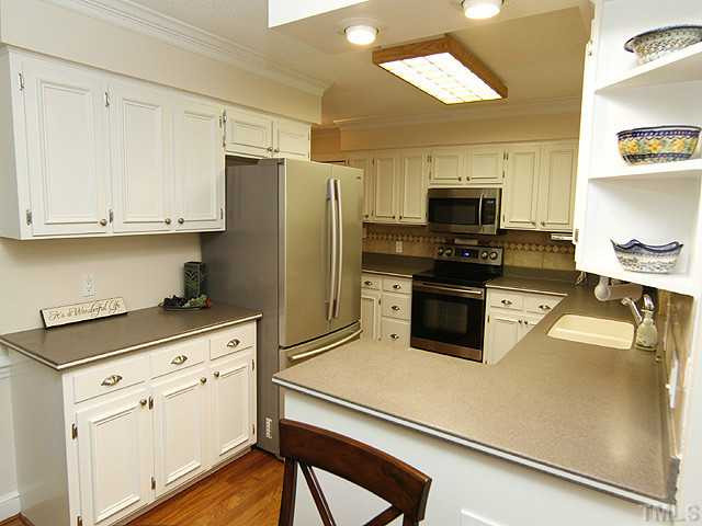 7908 Farnham Court Raleigh, NC 27615 - Photo 9 of 25 Kitchen Offers Great Counter Space for the Cook of the House. Kitchen