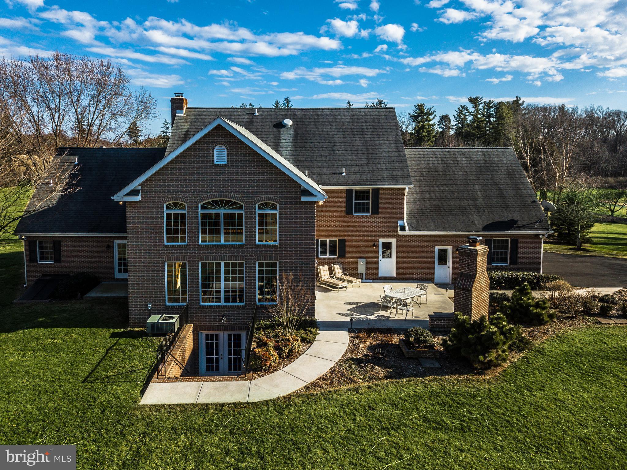 16400 Ed Warfield Road Woodbine, MD 21797 - Photo 29 of 30 Spacious back patio with fireplace