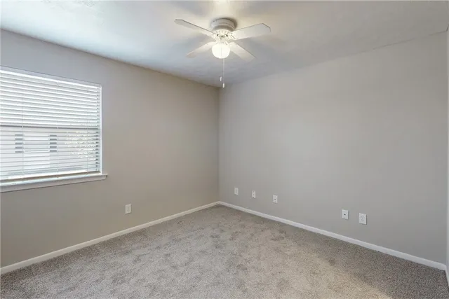 a view of a kitchen cabinets and wooden floor