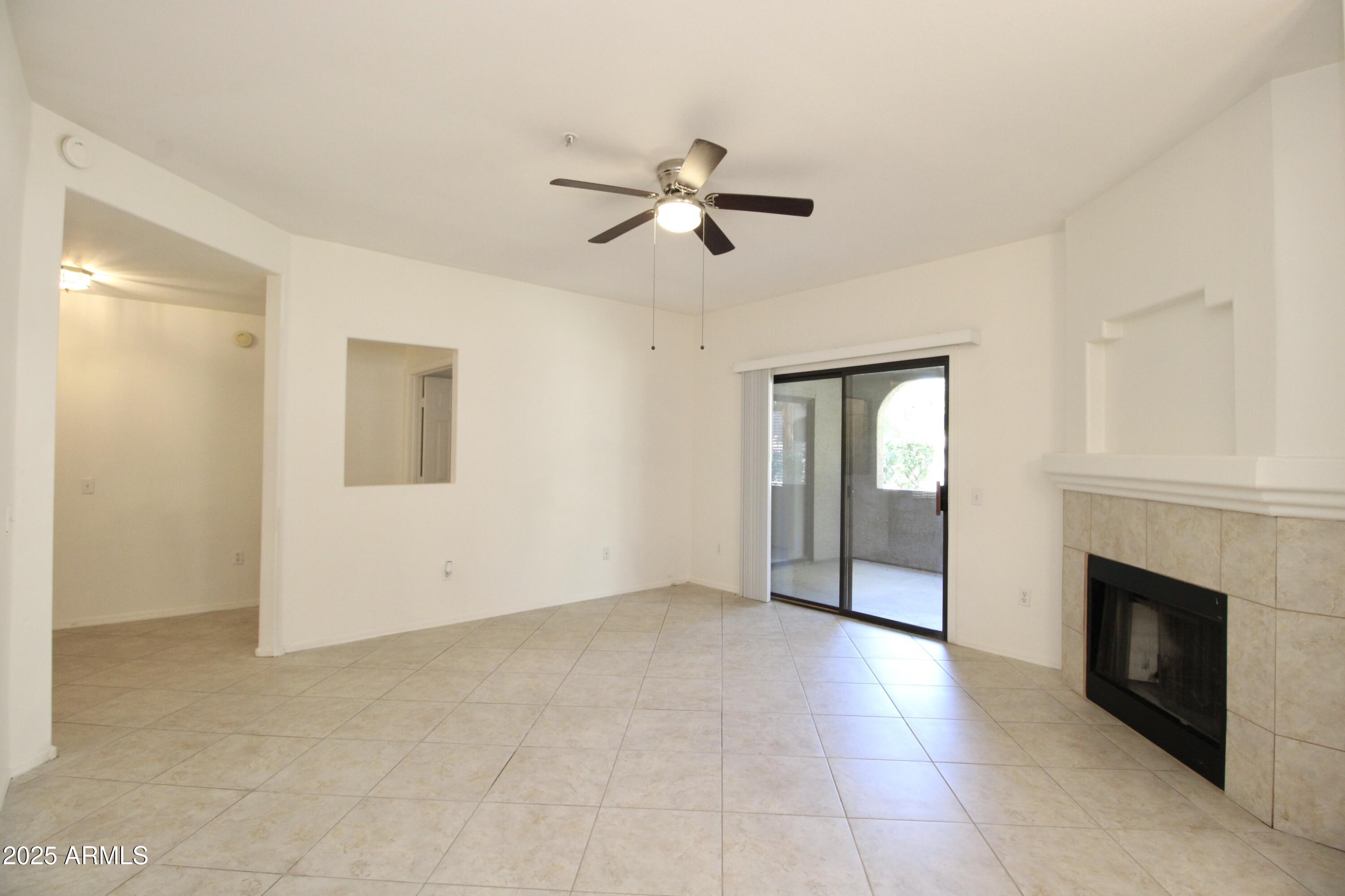 15050 North Thompson Peak Parkway, Unit 1012 Scottsdale, AZ 85260 - Photo 15 of 49 a view of empty room with ceiling fan