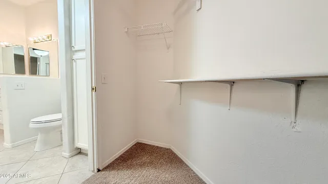 a view of bathroom with a toilet