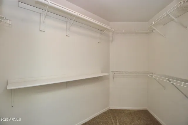 a view of a room with racks on the wall