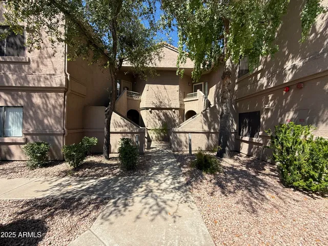 a house view with a garden space