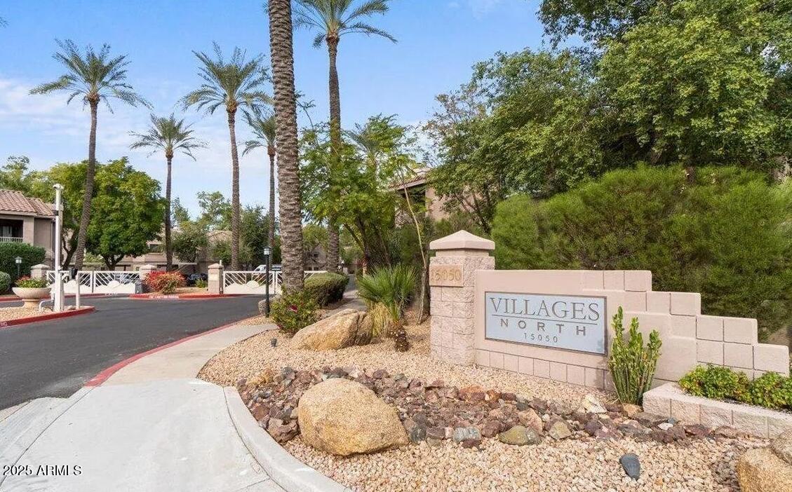 15050 North Thompson Peak Parkway, Unit 1012 Scottsdale, AZ 85260 - Photo 48 of 49 a sign board with a park bench