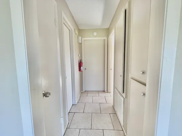 a bathroom with a sink mirror vanity and toilet