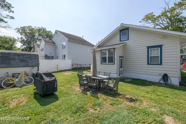 a backyard of a house with seating space