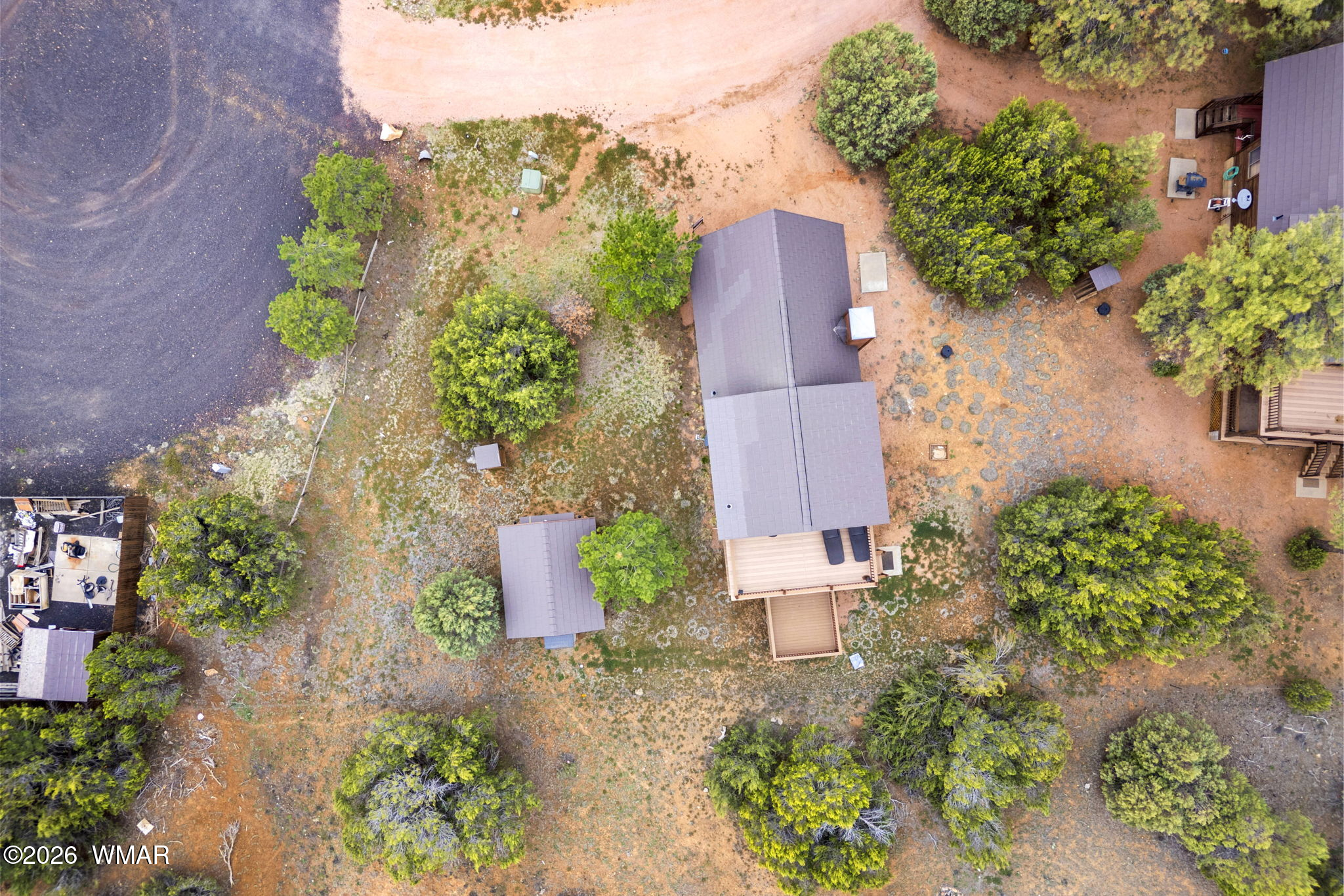 2741 Elk Trail Road Overgaard, AZ 85933 - Photo 62 of 68 an aerial view of a house with a yard and a garden