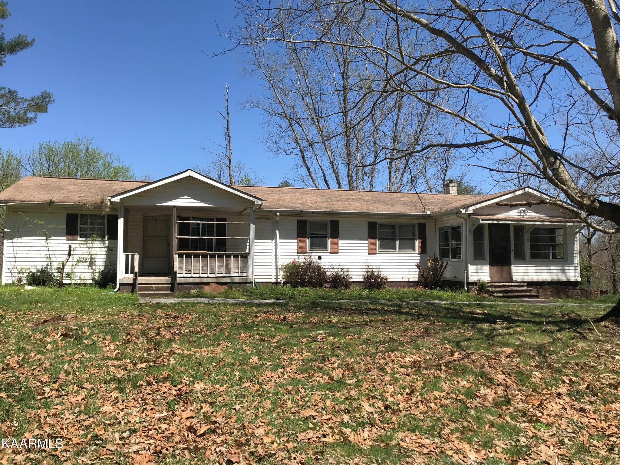 1679 Hillendale Road Crossville, TN 38572 - Photo 1 of 52 a front view of a house with a garden