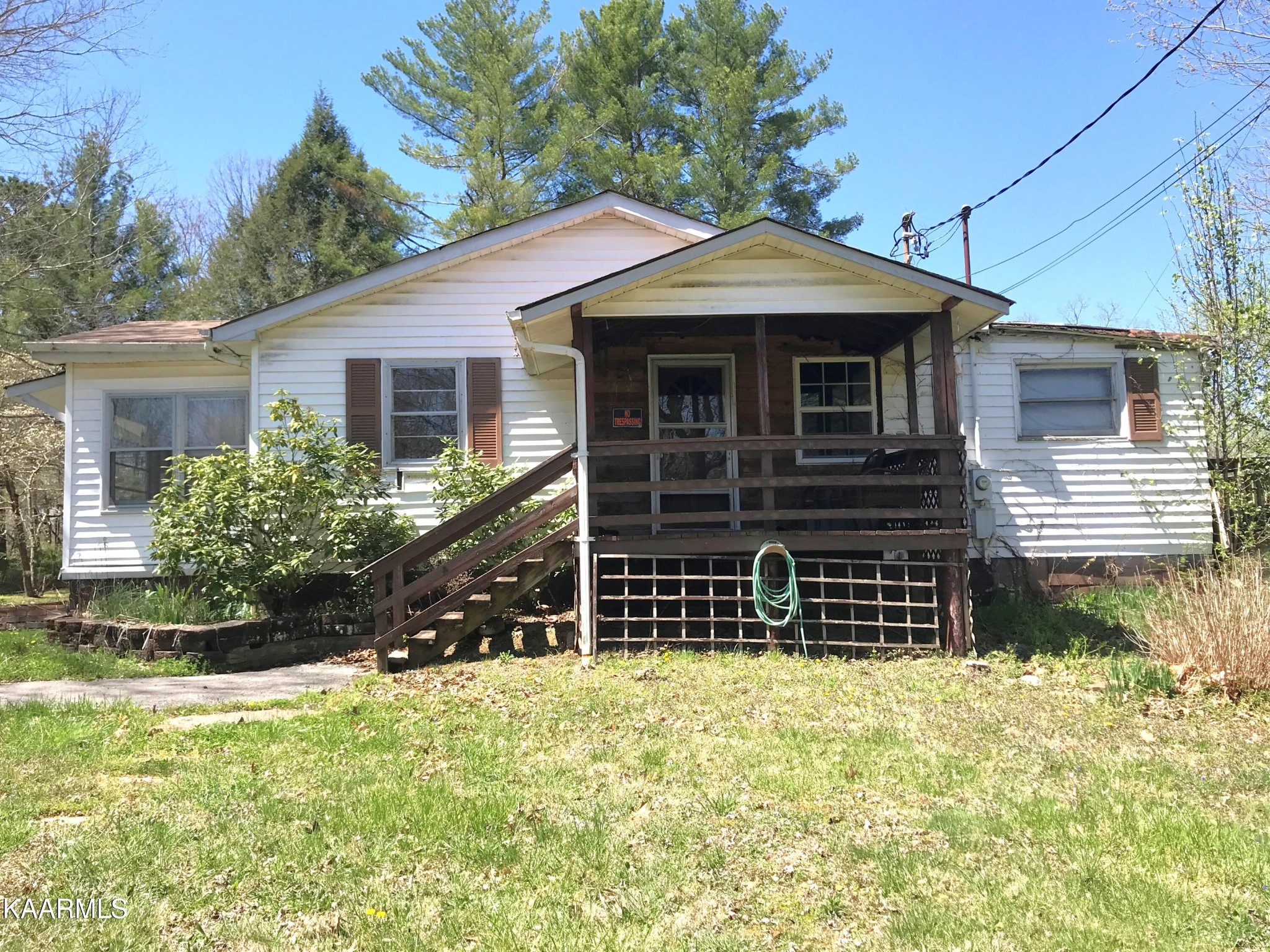 1679 Hillendale Road Crossville, TN 38572 - Photo 2 of 52 a front view of a house with a yard