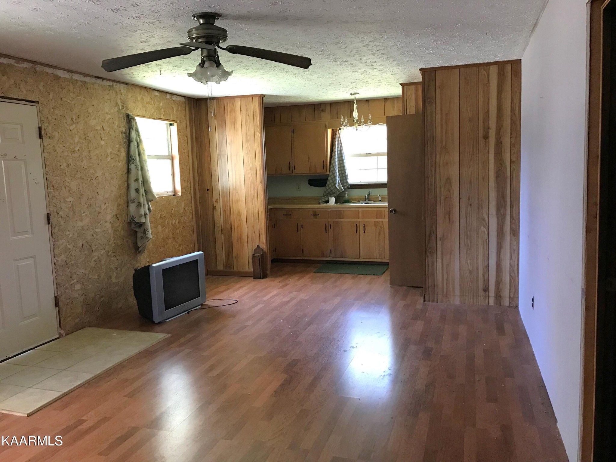 1679 Hillendale Road Crossville, TN 38572 - Photo 24 of 52 a kitchen with stainless steel appliances a refrigerator and wooden floor