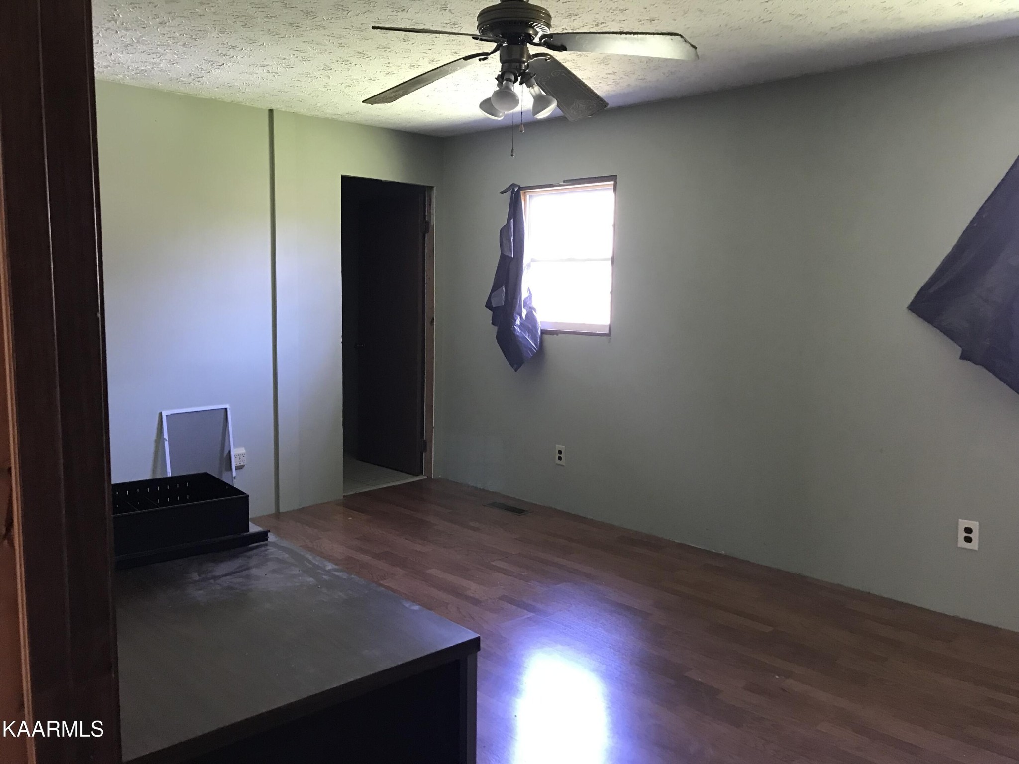 1679 Hillendale Road Crossville, TN 38572 - Photo 25 of 52 wooden floor in an empty room with a window