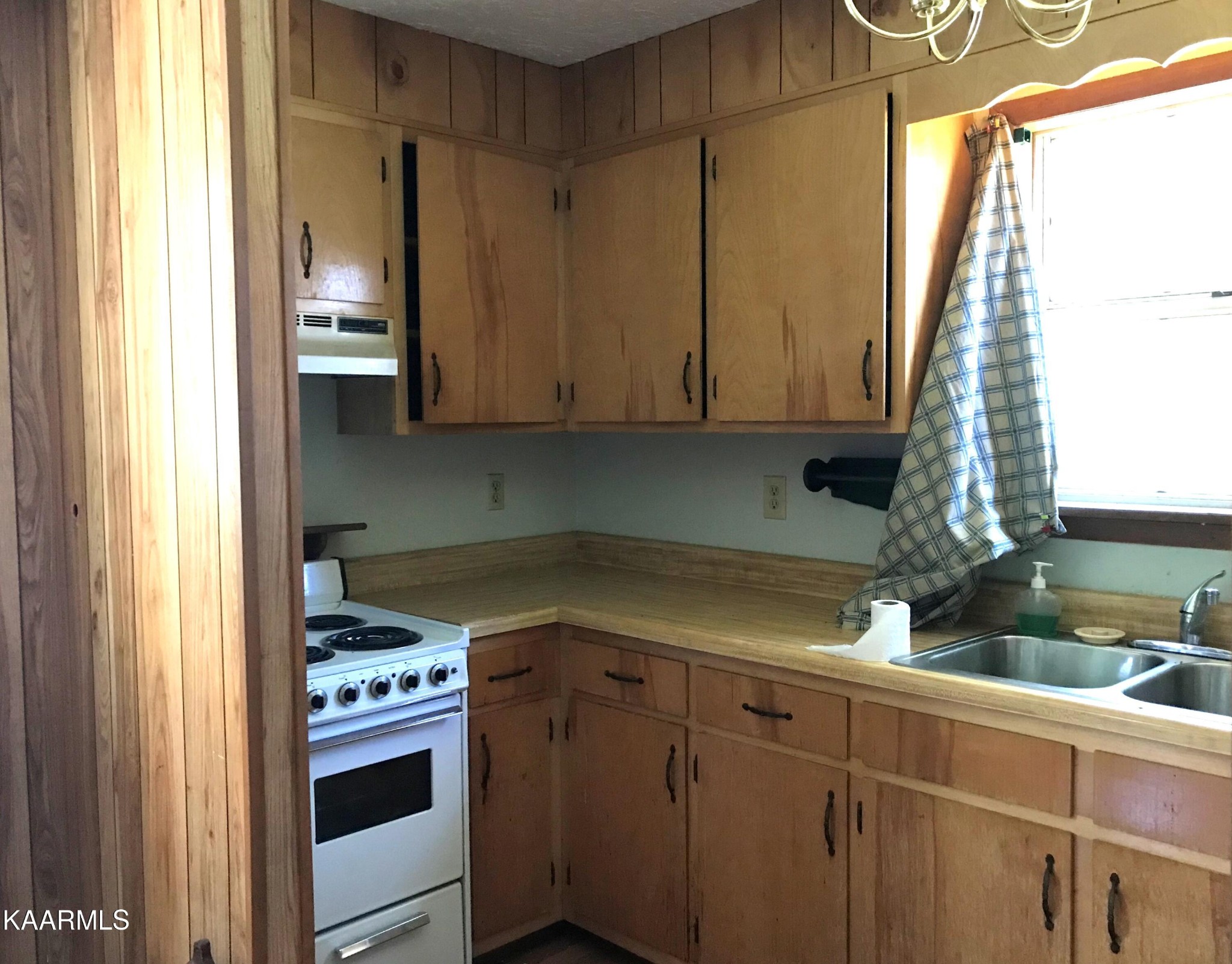 1679 Hillendale Road Crossville, TN 38572 - Photo 32 of 52 a kitchen with a sink and cabinets