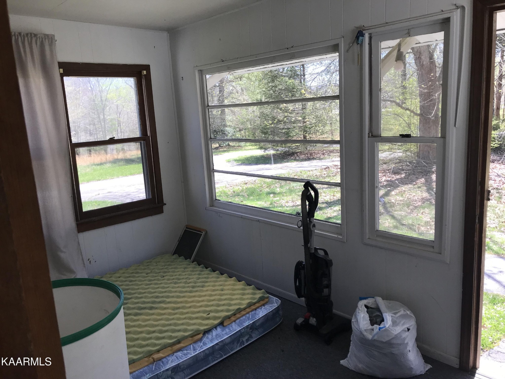 1679 Hillendale Road Crossville, TN 38572 - Photo 34 of 52 a bedroom with bed and a window