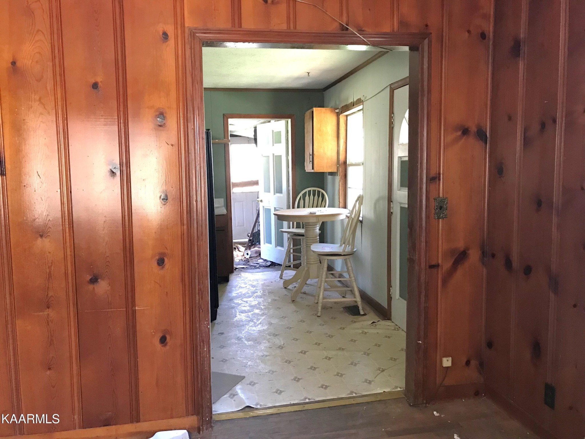 1679 Hillendale Road Crossville, TN 38572 - Photo 38 of 52 a view of a hallway with wooden floor and a bathroom