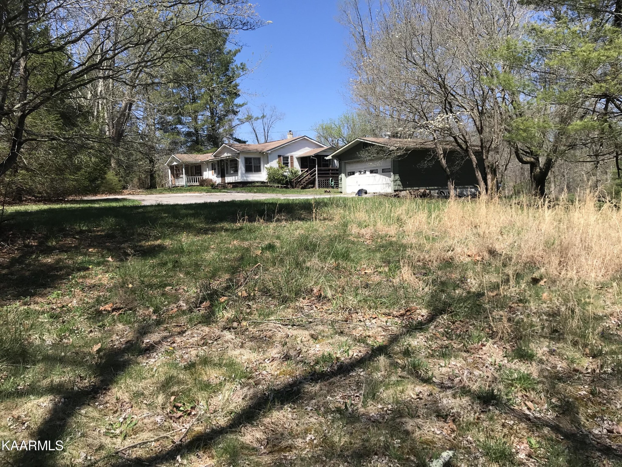 1679 Hillendale Road Crossville, TN 38572 - Photo 10 of 52 a view of house with trees in the background
