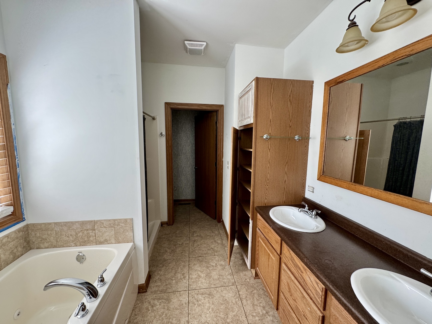 815 West Hudson Street Princeton, IL 61356 - Photo 14 of 23 a bathroom with a granite countertop sink toilet and shower