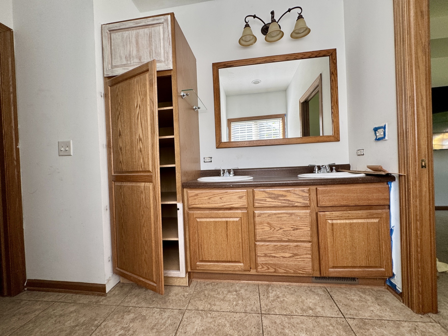 815 West Hudson Street Princeton, IL 61356 - Photo 15 of 23 a kitchen with a refrigerator and cabinets