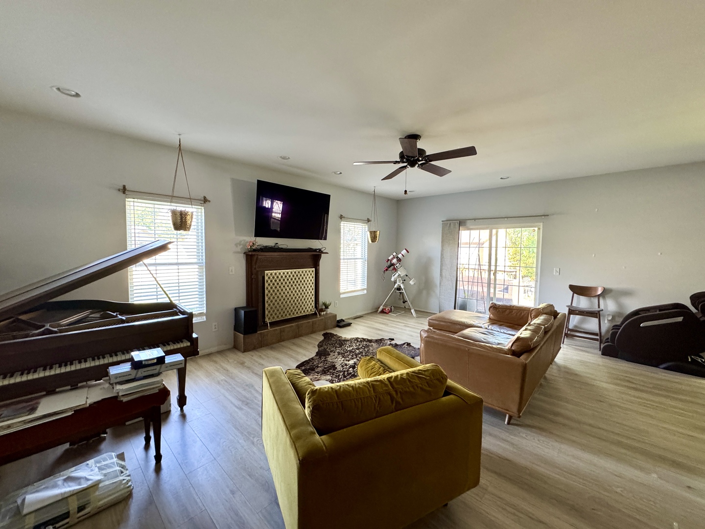 815 West Hudson Street Princeton, IL 61356 - Photo 7 of 23 a living room with fireplace furniture and a wooden floor