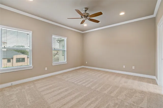 a bathroom with a granite countertop bathtub a double vanity sink and a large mirror