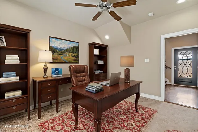 a view of a workspace with furniture