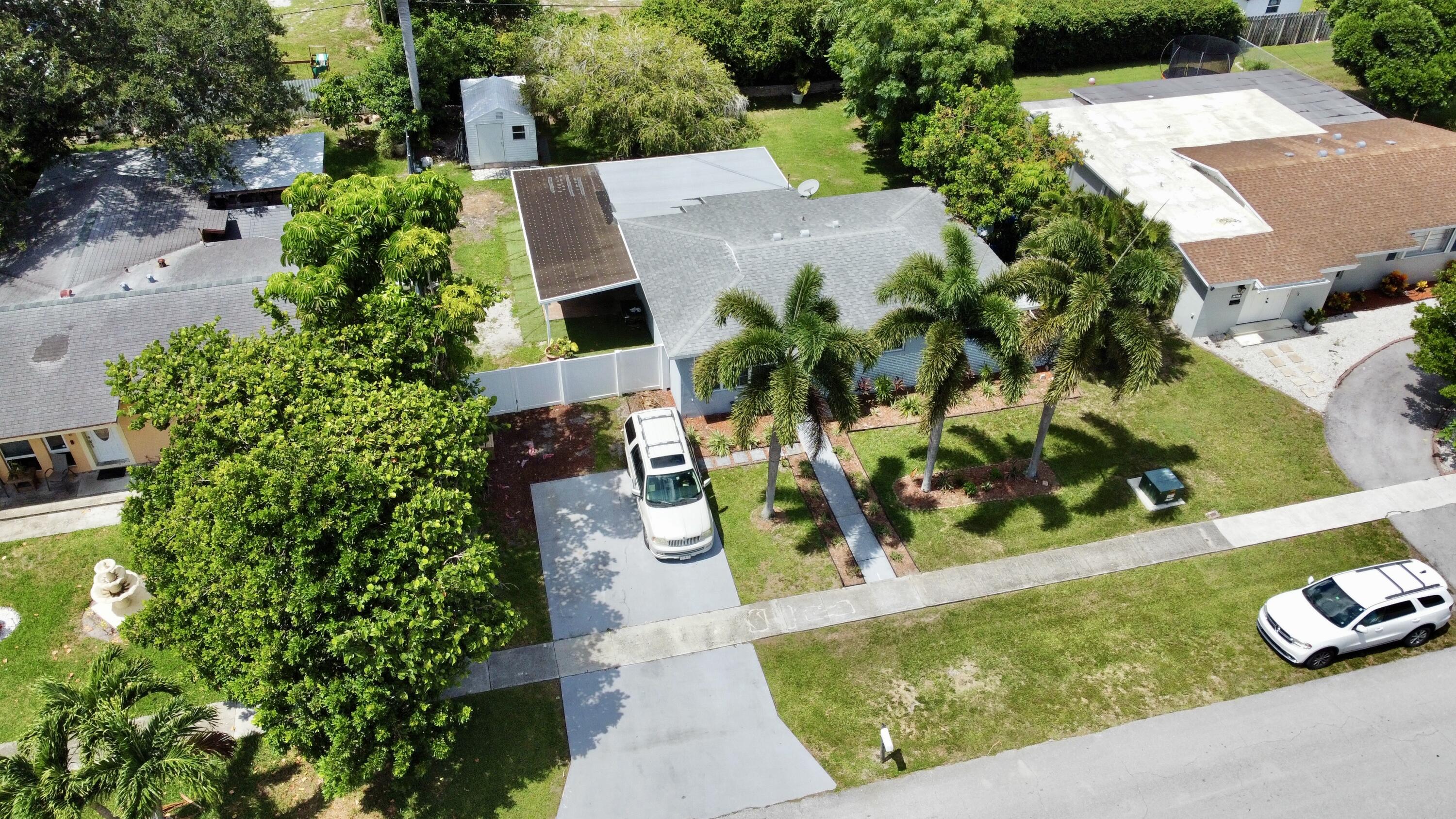 344 Shady Lane Road Palm Springs, FL 33461 - Photo 3 of 16 dji_fly_20240621_150508_417_171899671715