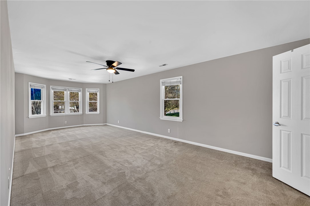1509 Crestview Road Easley, SC 29642 - Photo 17 of 31 This spacious room provides ample natural light and comfortable carpeting, ready for personalization.