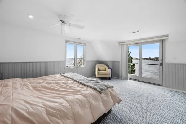 a bedroom with a bed and a cabinets