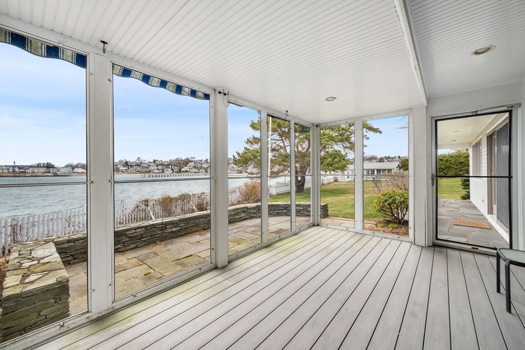31 Lincoln House Point Swampscott, MA 01907 - Photo 27 of 33 a view of a room with wooden floor and city view
