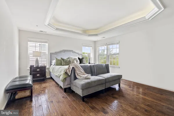 a bed room with a bed and a couch