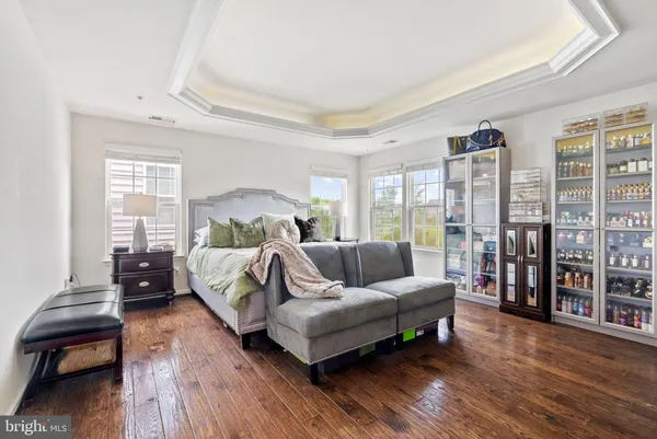 a bed room with a bed and a couch