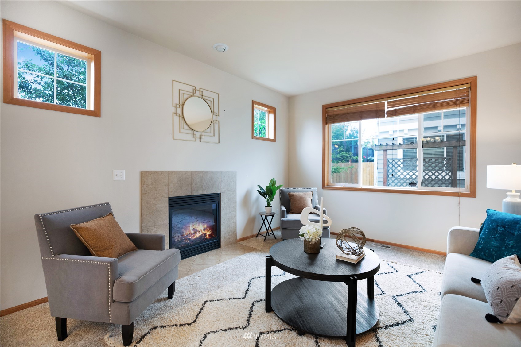 4412 Northeast 3rd Lane Renton, WA 98059 - Photo 11 of 26 a living room with furniture and a fireplace