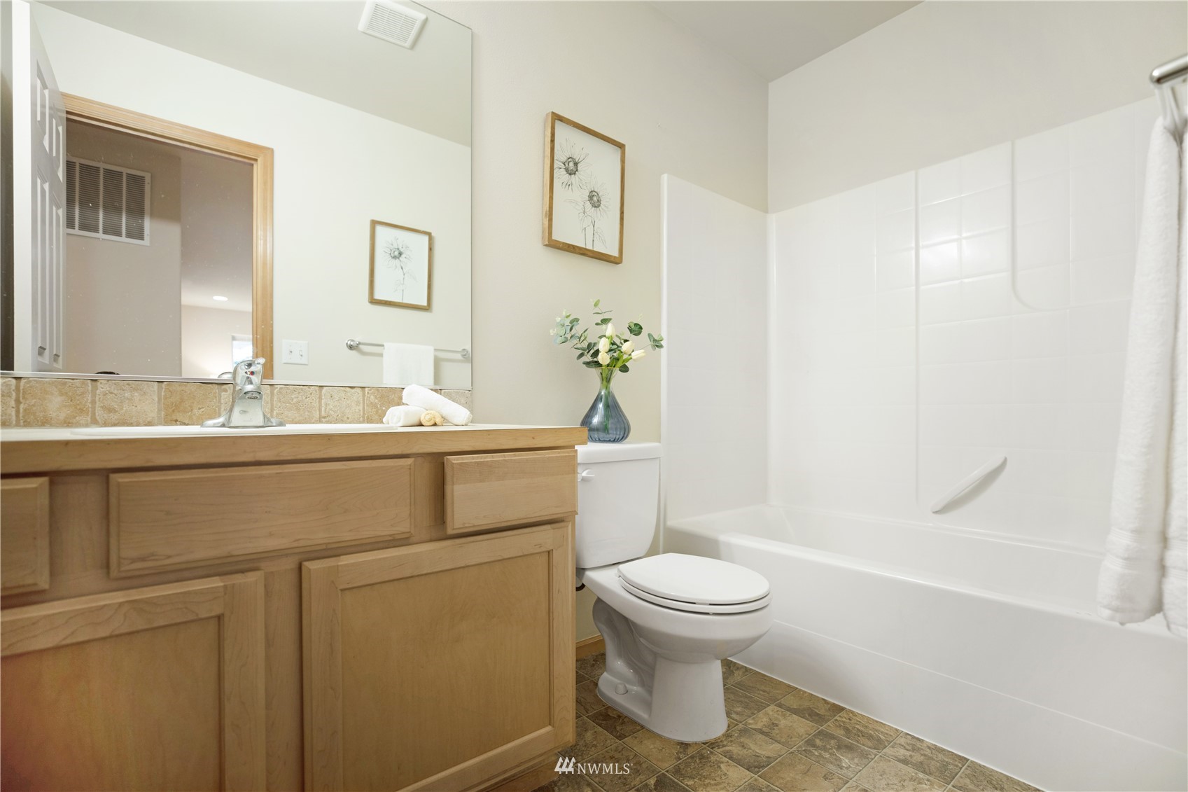 4412 Northeast 3rd Lane Renton, WA 98059 - Photo 20 of 26 a bathroom with a sink toilet and shower