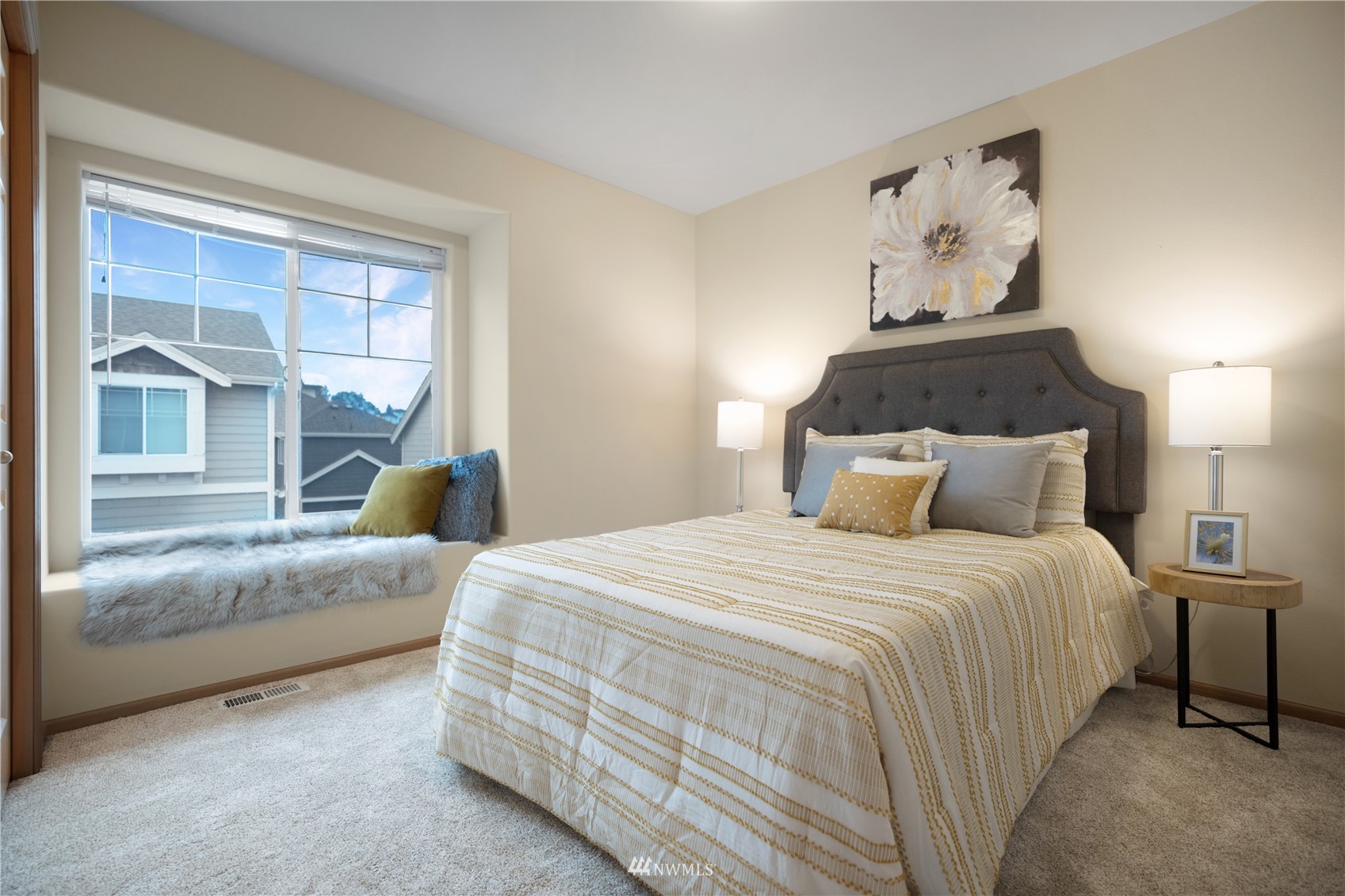 4412 Northeast 3rd Lane Renton, WA 98059 - Photo 22 of 26 a bedroom with a large bed and a window