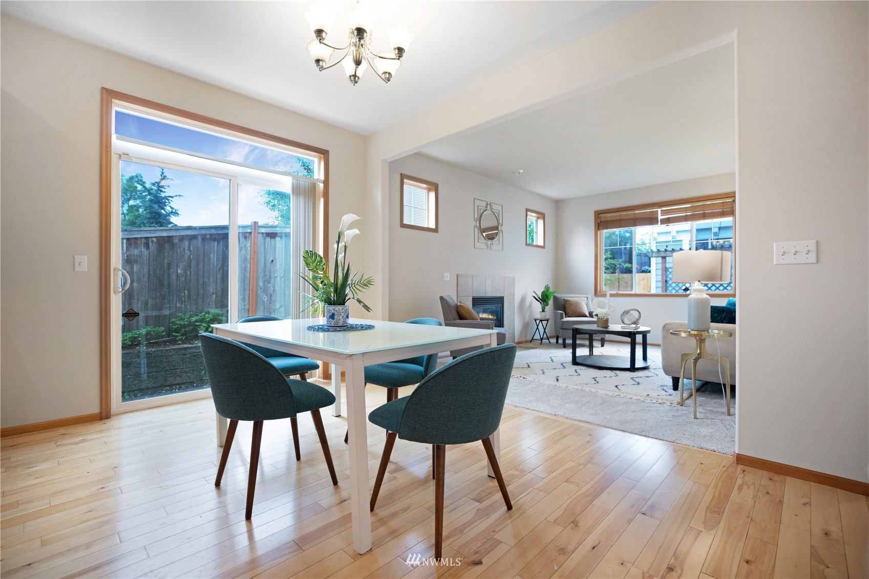 4412 Northeast 3rd Lane Renton, WA 98059 - Photo 8 of 26 a view of a dining room with furniture window and wooden floor
