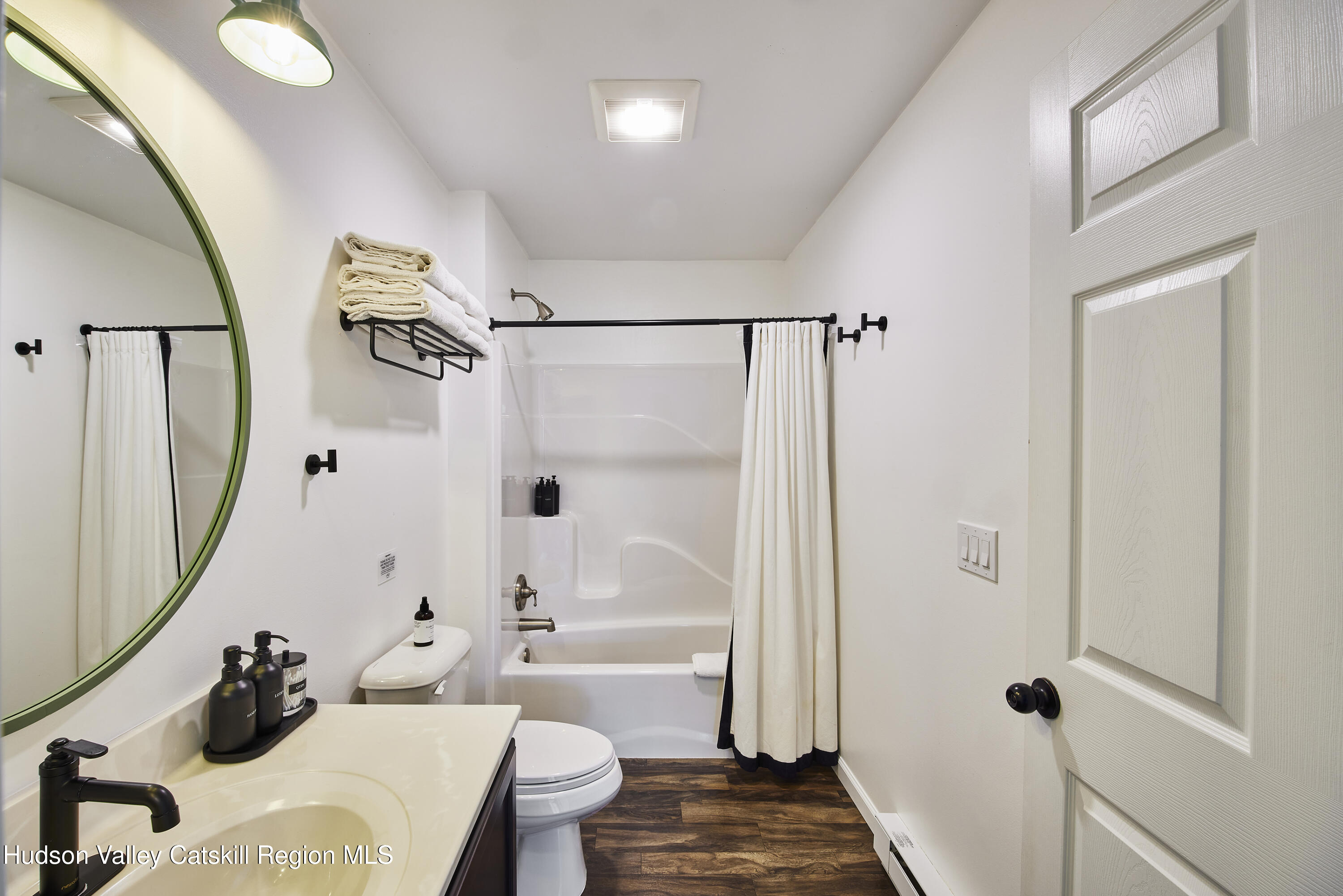 55 Hunter Road Parksville, NY 12768 - Photo 16 of 35 a bathroom with a tub toilet and a shower
