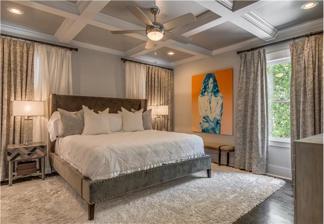 3518 Murphy Road Nashville, TN 37205 - Photo 11 of 20 a bedroom with a large bed and a large window