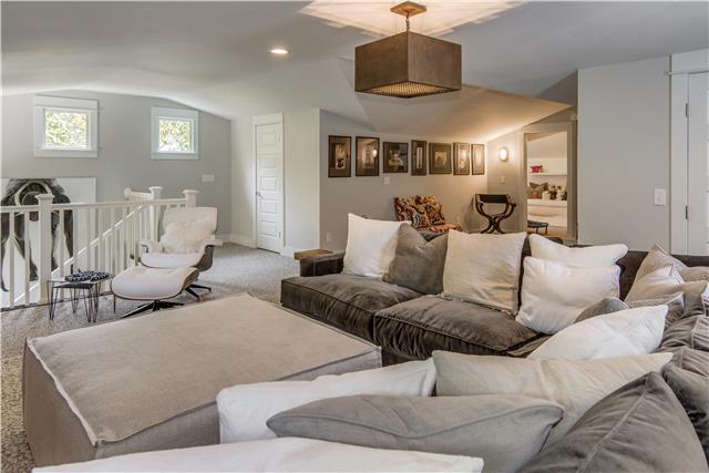 3518 Murphy Road Nashville, TN 37205 - Photo 15 of 20 a living room with furniture and a chandelier