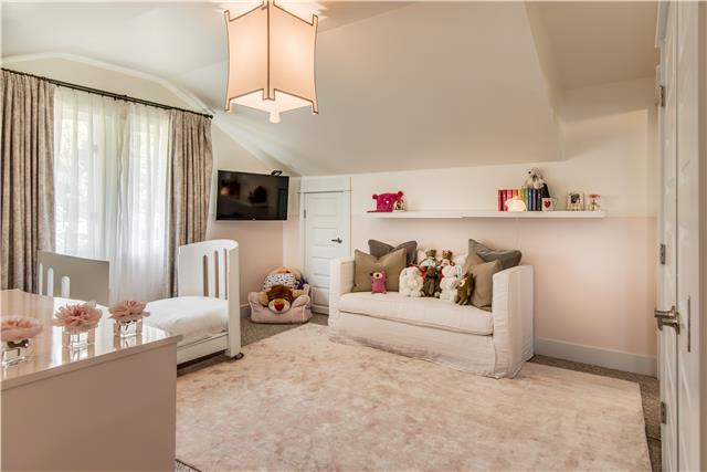 3518 Murphy Road Nashville, TN 37205 - Photo 16 of 20 a bedroom with furniture and a flat screen tv