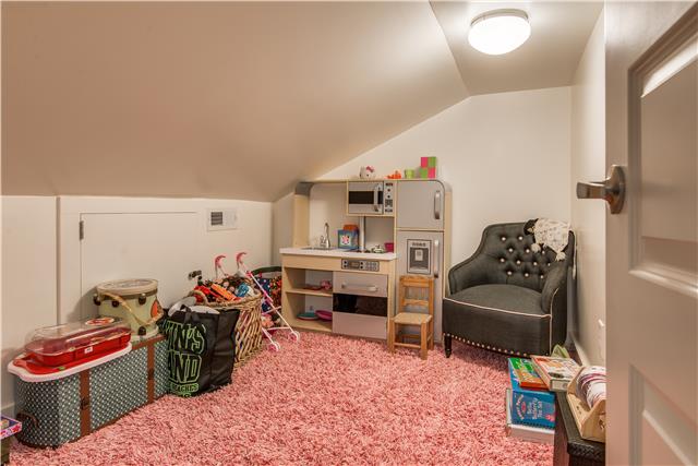 3518 Murphy Road Nashville, TN 37205 - Photo 17 of 20 a bedroom with furniture and a fan