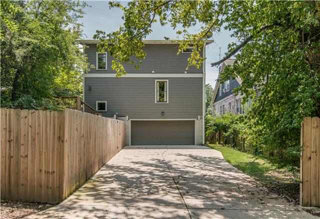 3518 Murphy Road Nashville, TN 37205 - Photo 20 of 20 a front view of a house with a yard