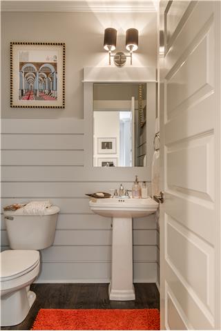 3518 Murphy Road Nashville, TN 37205 - Photo 10 of 20 a bathroom with a toilet sink and mirror