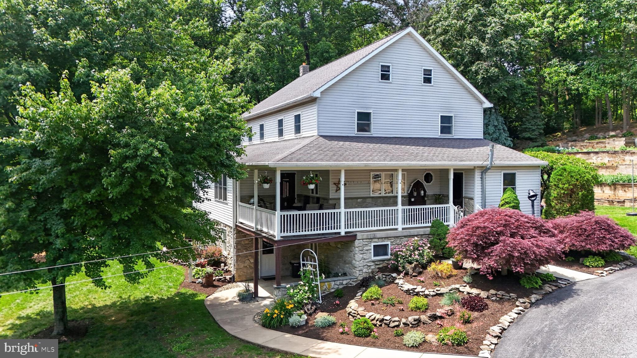 257 Hill Road New Holland, PA 17557 - Photo 15 of 94 Charming home with lush landscaping.