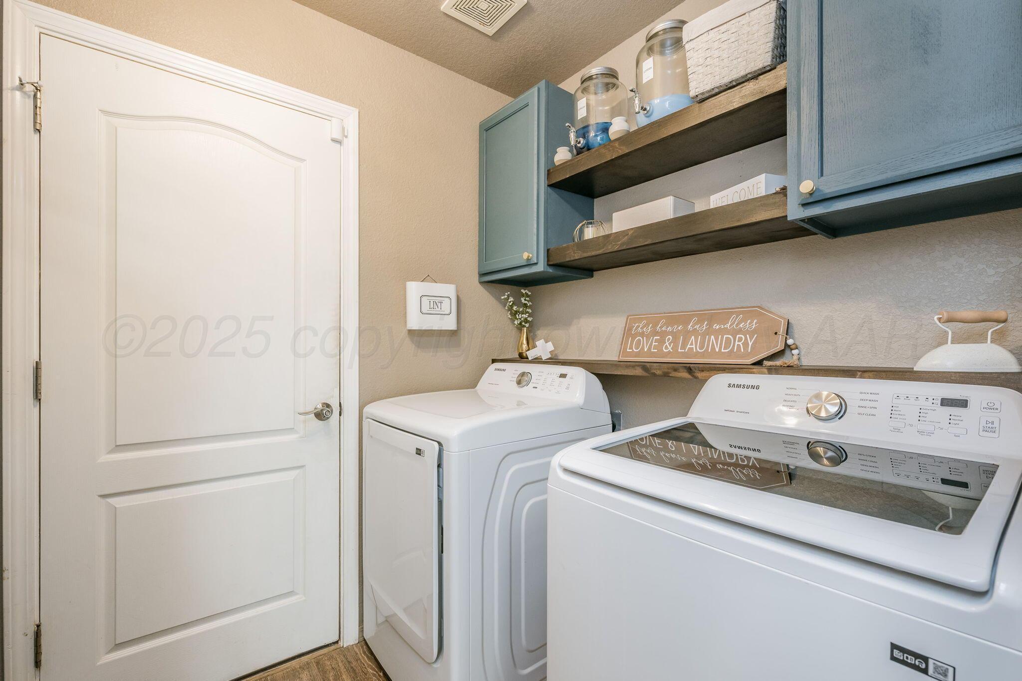 1404 Southwest 61st Avenue Amarillo, TX 79118 - Photo 24 of 30 a utility room with dryer and washer