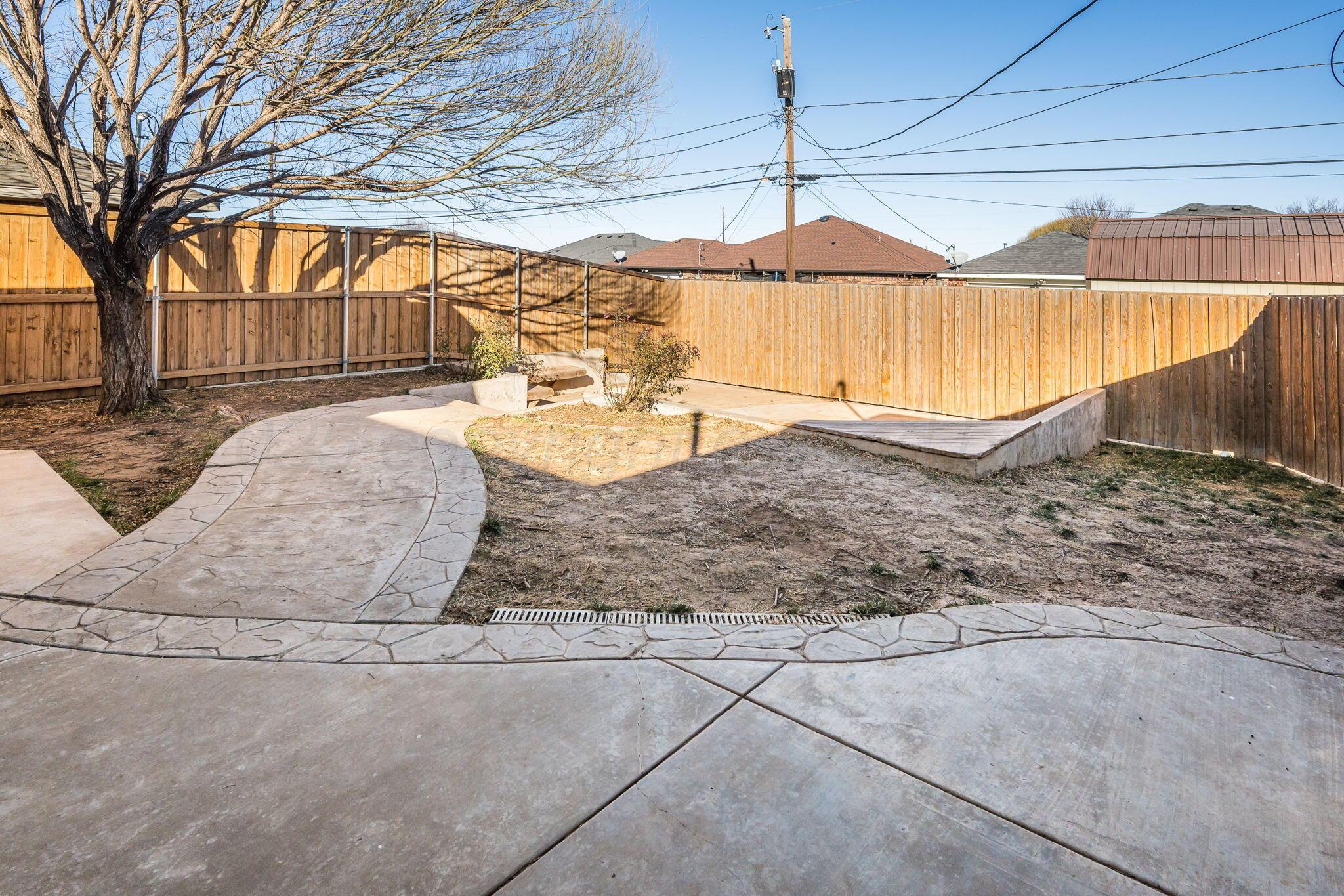 1404 Southwest 61st Avenue Amarillo, TX 79118 - Photo 28 of 30 a view of a backyard of a house