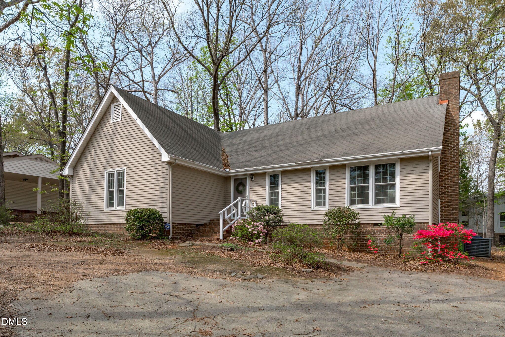 3304 Wade Avenue Raleigh, NC 27607 - Photo 36 of 38 a front view of a house with garden
