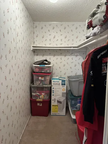 a room with storage and utility