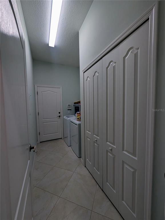 343 Marsh Creek Road Venice, FL 34292 - Photo 21 of 30 a view of a hallway with closet area