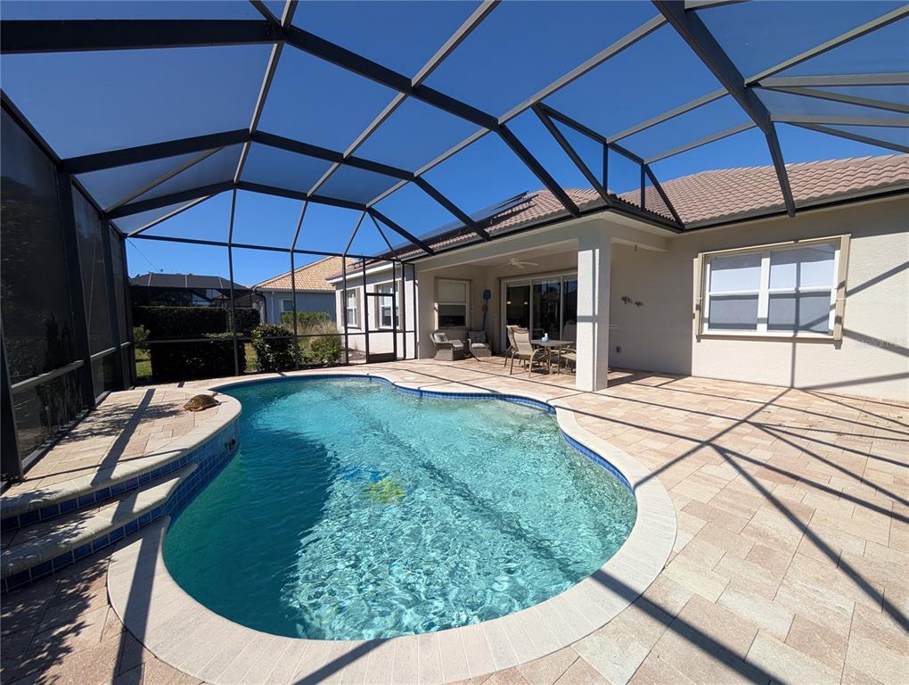 343 Marsh Creek Road Venice, FL 34292 - Photo 23 of 30 a view of a backyard with sitting area