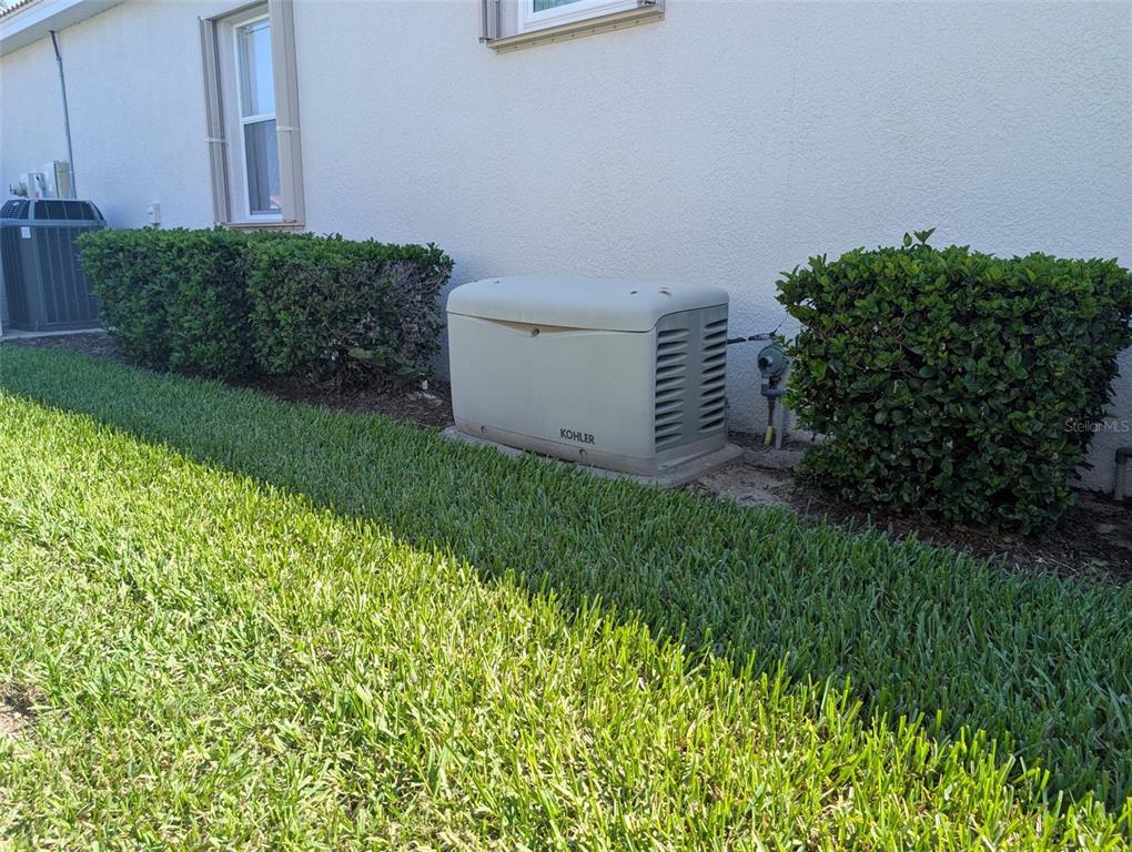 343 Marsh Creek Road Venice, FL 34292 - Photo 28 of 30 a view of a back yard from a garden