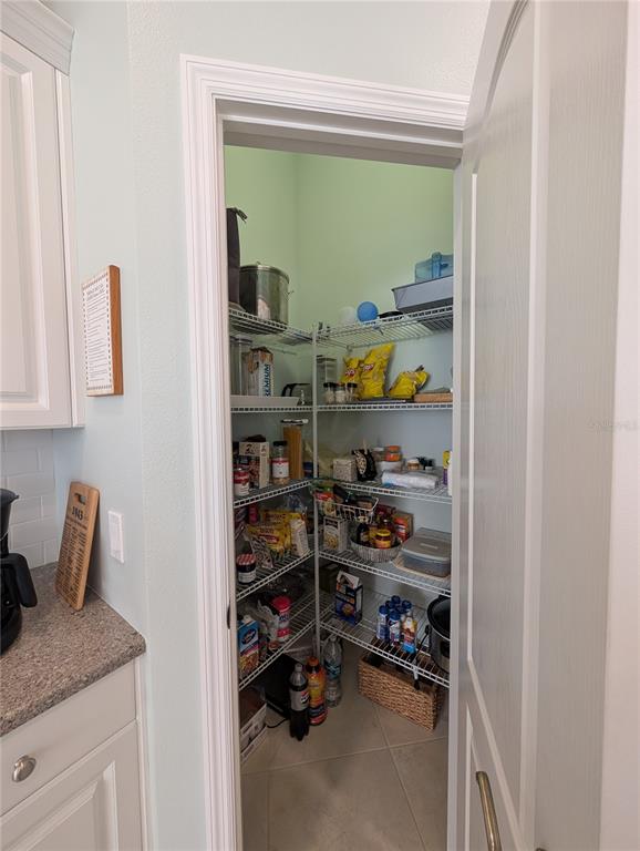 343 Marsh Creek Road Venice, FL 34292 - Photo 10 of 30 a room with storage and utility